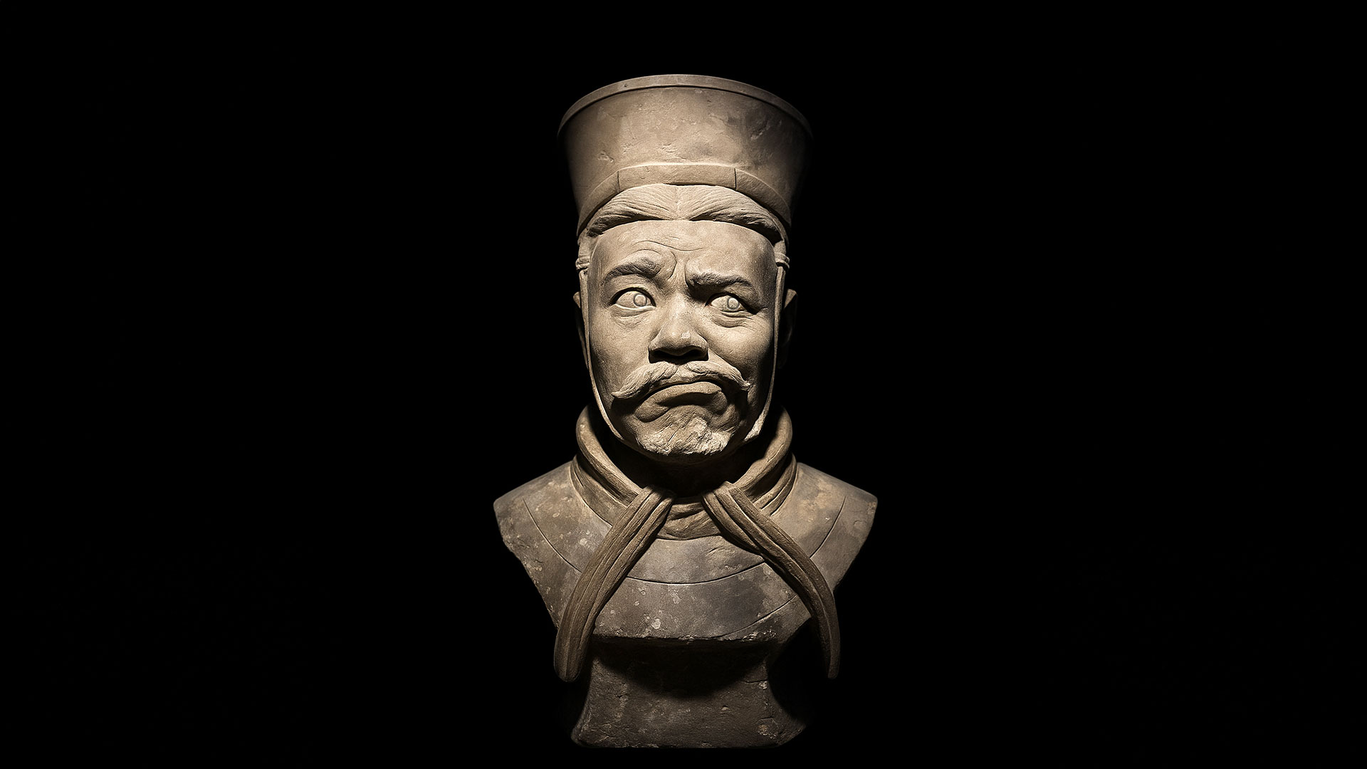 Eine fiktive Büste von Sun Tzu mit einem fragenden Gesichtsausdruck.